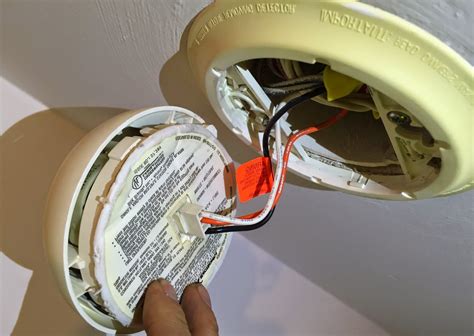 do not install smoke alarm over ac electrical box|battery operated alarm over box.